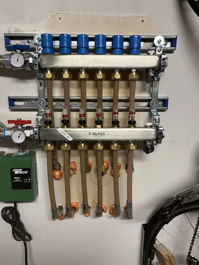 Plumber performing Water Heater Repair at a residential property in Moses Lake North